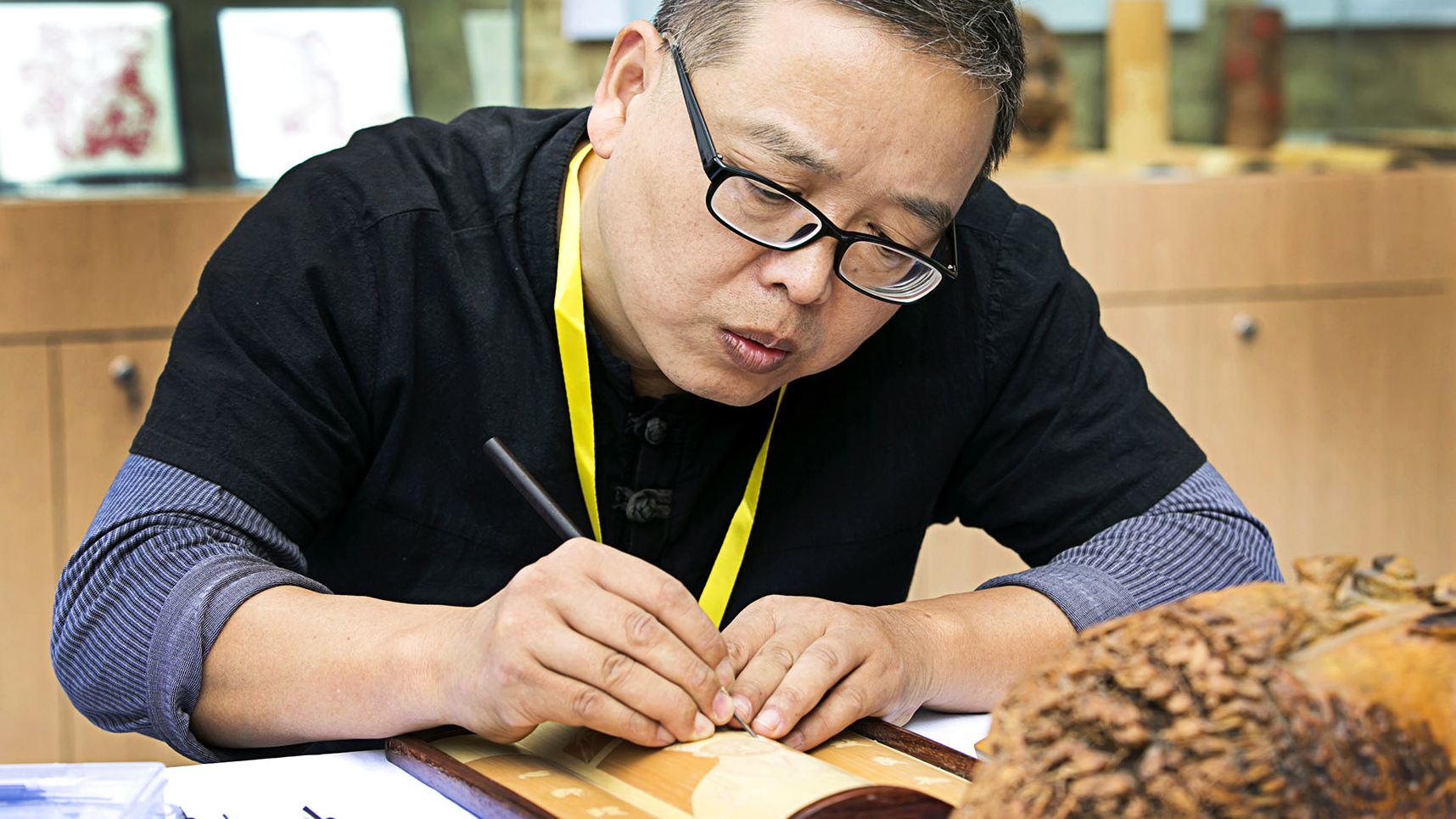 The maker of miniature worlds