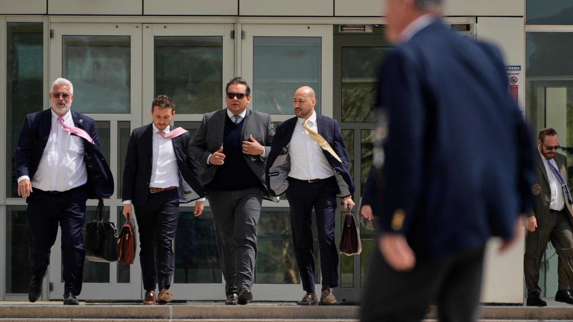 Former US Representative George Santos sentenced to 87 months in prison